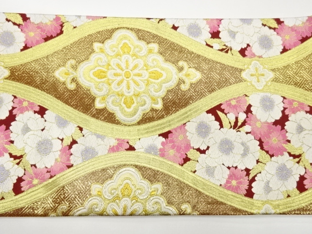  立涌に華紋・桜模様織出し袋帯